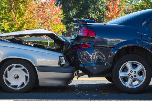 What is the difference between stacked and non-stacked uninsured motorist coverage